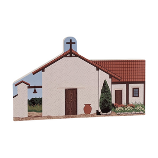 3/4" thick wooden illustration of a church on a white background