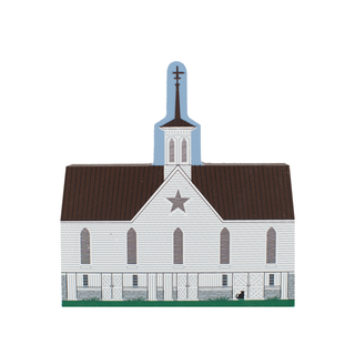 3/4" thick wooden cutout  of a white barn with a star on the front and brown roof