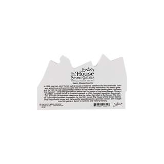 Back of a  product with text on a white background about the house of seven gables