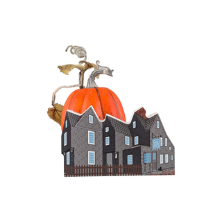Decorative house with a pumpkin roof on a white background