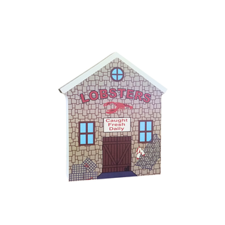 House-shaped wooden replica sign with 'LOBSTERS Caught Fresh Daily' text and lobster graphics 