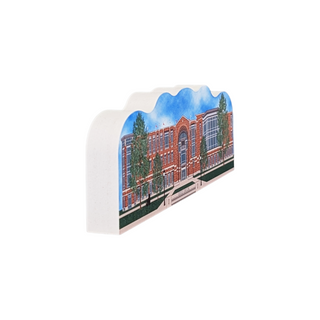3/4" thick wooden replica with an Illustration of a brick building with trees and a blue sky