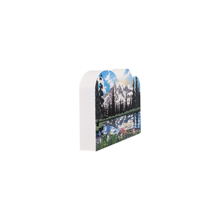 3/4" wooden cut out replica of an illustration of mountains and a reflection in a lake with wildflowers around 