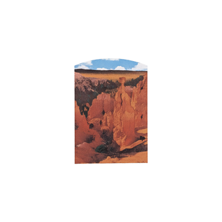 3/4" wooden cut out replica of a Canyon landscape with rock formations and blue sky