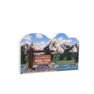 3/4" wooden replica with an illustration  of Grand Teton National Park with mountains and lake in the background.