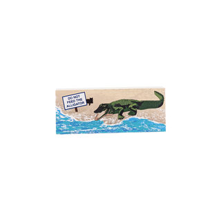 3/4" wooden replica with an illustration of an  alligator with a sign saying 'Do not feed the alligator' on a beach background