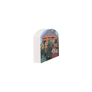 3/4" wooden replica with an illustration  of a gazebo with a bicycle and plants on a white background