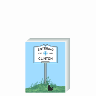 Wooden 3/4" Replica with a sign designating 'Entering Clinton' on a blue background