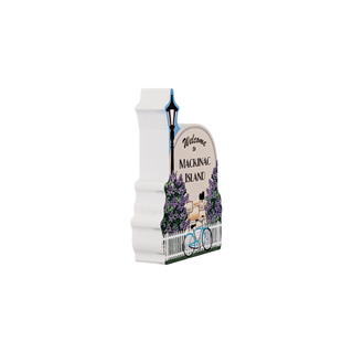 3/4" wooden replica with an illustration of a sign with 'Welcome to Mackinac Island' text on a white background