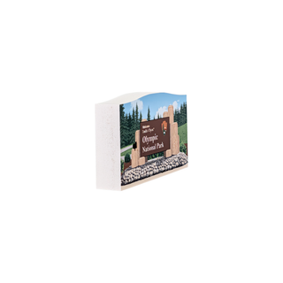3/4" wooden cut out replica of an illustration of a Olympic National Park sign with trees and rocks on a white background