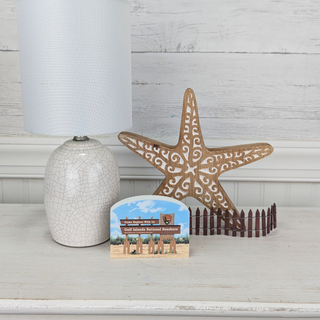 3/4" thick wooden illustration of a sign on display