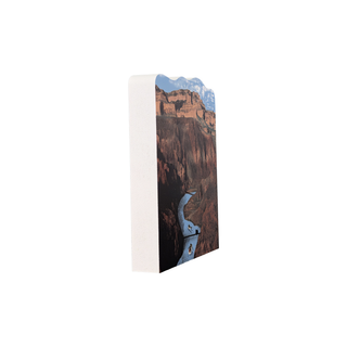 3/4" thick wooden illustration of a canyon with a river and boats on a white background