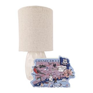 Lamp with a decorative Connecticut-shaped 3/4" thick wooden figurine on a white background