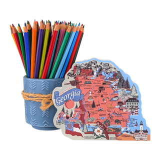 Colorful pencils in a blue holder with a Georgia-themed 3/4" thick wooden map on a white background