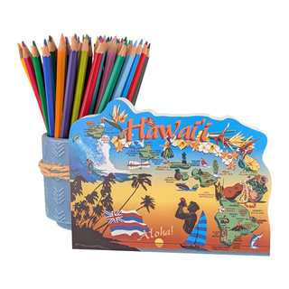Colorful pencils in a holder with a 3/4" thick wooden Hawaii-themed figurine on a white background