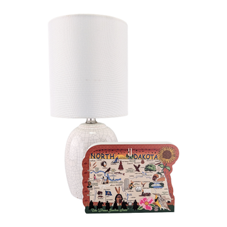 Lamp with a decorative 3/4" thick wooden North Dakota-shaped map on a white background