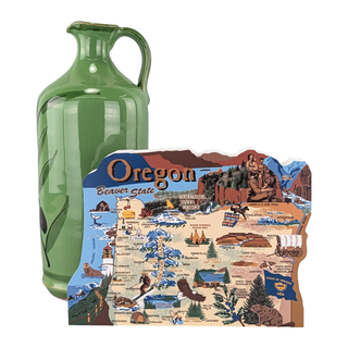 Green ceramic pitcher next to a 3/4" thick wooden decorative map of Oregon on a white background