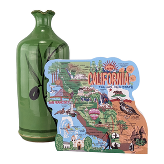 Green ceramic bottle next to a 3/4" thick wooden decorative map of California on a white background