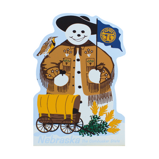 Stylized 3/4" thick wooden  illustration of a cowboy with a flag, wagon, and nature elements on a blue background.