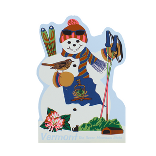 3/4" thick wooden cutout of a Skiing snowman with Vermont flag design on a light blue background