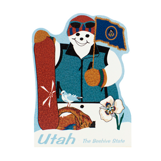 3/4" thick wooden cutout of a snowman with a Utah flag, snowboard, and state flower, with 'Utah The Beehive State' text.