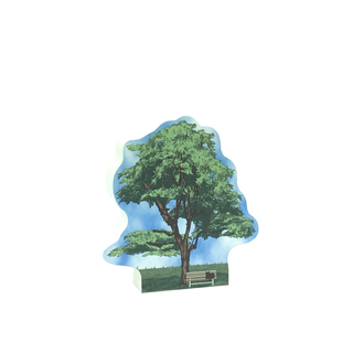 3/4" thick wooden  cutout of a tree with a bench underneath on a white background