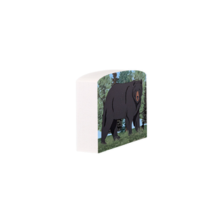 3/4" thick wooden illustration of a black bear in a forest setting on a white background