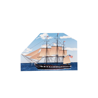 3/4" thick wooden model of a three-masted sailing ship on a blue background with white clouds