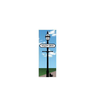 wooden replica Street sign on a lamppost with 'Willow Drive' text against a blue sky.