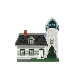 3/4" thick wooden Illustration of a house with a lighthouse attached on a white background