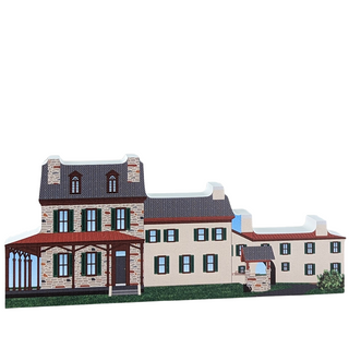 3/4" wooden replica with an illustration of a two-story house with a stone facade and beige exterior on a white background