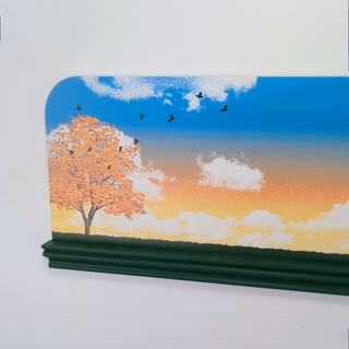 scenic design of a tree, birds, and sky on a white background