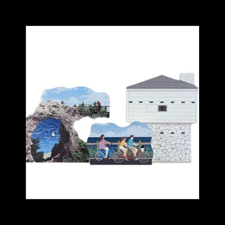 photo of scenic views including a stone tower, people on bicycles, and a coastal scene.