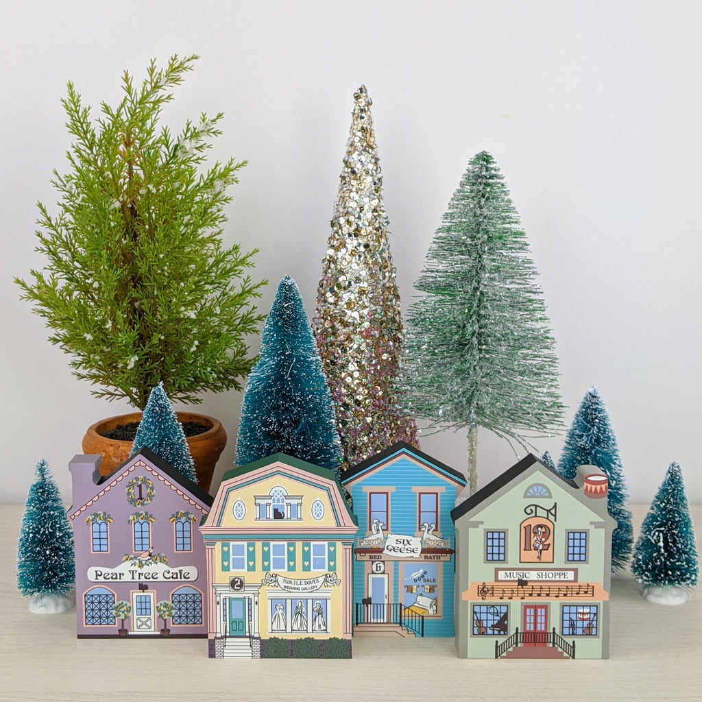 video of twelve days of christmas set of 12 3/4" thick wooden replicas on a white wooden background 