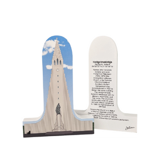 3/4" thick wooden replica with an Illustration of Hallgrémskirkja church and text on a white background