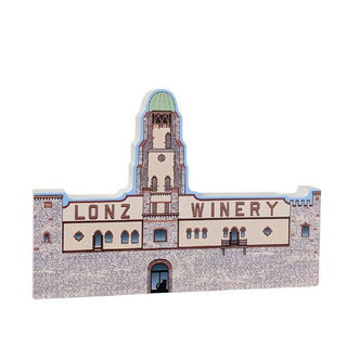 3/4" thick wooden cutout  of Lonz Winery building on a white background