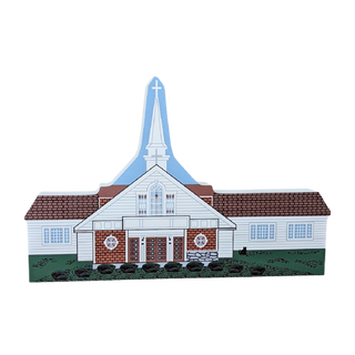 wooden replica of a church building with a steeple 