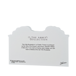 Back of a 3/4" thick wooden product with 'The Abbey Collection' branding and text about Villa Rocabella.