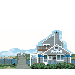3/4" thick wooden Illustration of a coastal building with a dock and water in the background