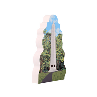 3/4" thick wooden cutout  of a monument with trees and sky in the background