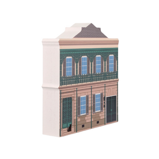 3/4" thick wooden illustration of a two-story building with architectural details on a white background