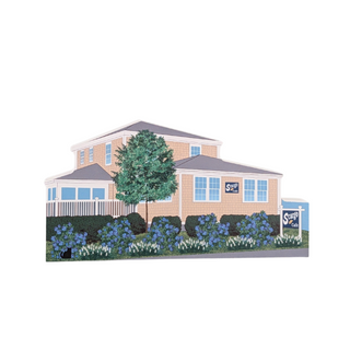 3/4" thick wooden figurine of a yellow house on white background