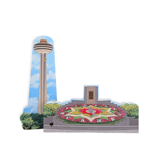 3/4" thick wooden cutout of Niagara Falls with a tower and flower garden design.