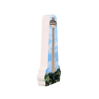 3/4" thick wooden cutout with a tower design on a white background