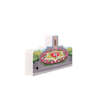 3/4" thick wooden cutout of a scenic landscape with a clock tower and floral design, featuring the text 'NPS'.