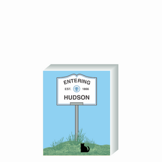Wooden 3/4" Replica with a sign designating 'Entering Hudson' on a blue background