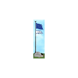 3/4" thick wooden Alaska state flag on a pole with 'The Last Frontier' sign in front, against a blue sky.