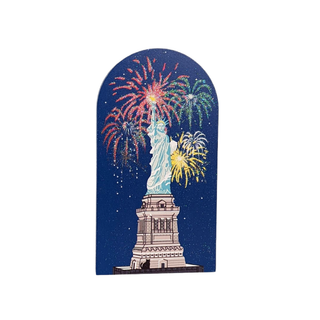 3/4" thick wooden cutout of the Statue of Liberty with fireworks against a blue sky