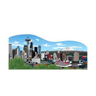 3/4" thick wooden cutout of  a city skyline with a mountain in the background
