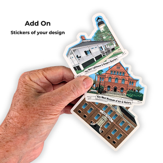A hand holds three die-cut stickers shaped like historic buildings on a white background, with text reading 'Add On Stickers of your design.' The stickers show illustrated architecture in blue, red, brown, green, and white tones.